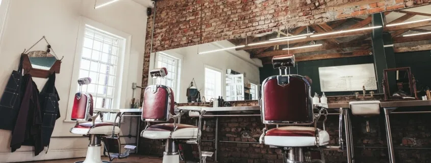 Rustic barber shop interior with exposed brick